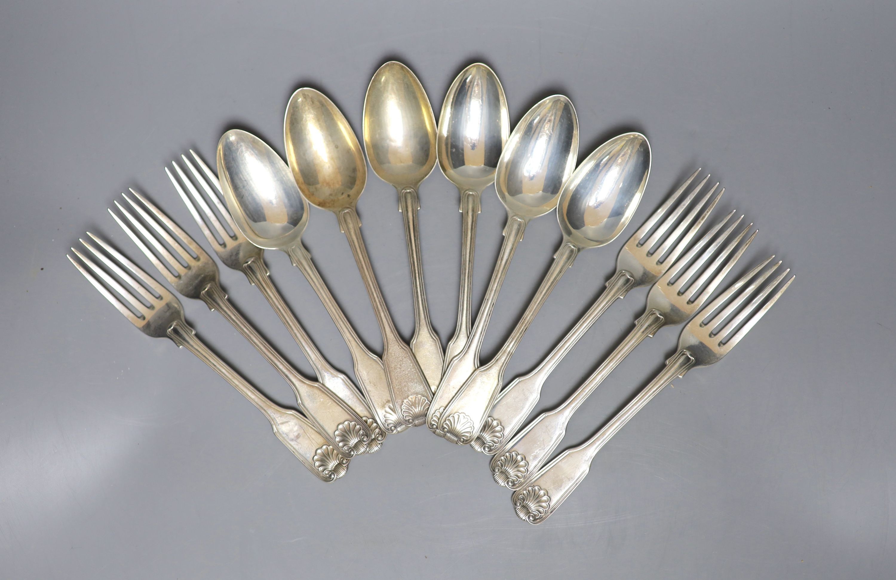 A set of six George IV silver fiddle, thread and shell pattern dessert forks, Eley & Fearn, London, 1823 and a harlequin set of six dessert spoons, 20oz